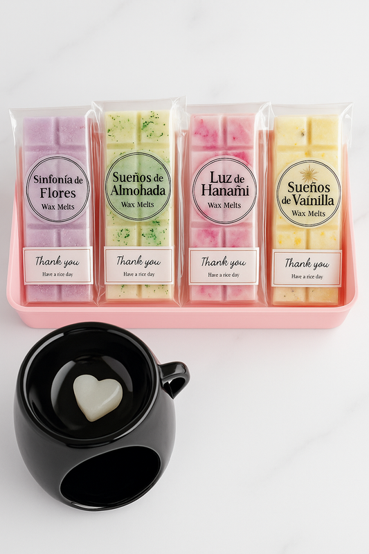Pack surtido de wax melts Sueños Perfumados, incluye Caprichos de Seda y Frambuesa con etiqueta visible.

